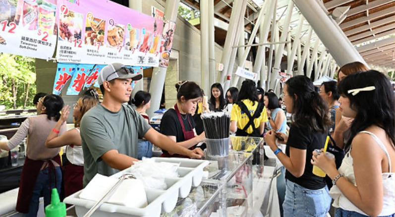 People line up for food and beverages at Asia Fest 2025